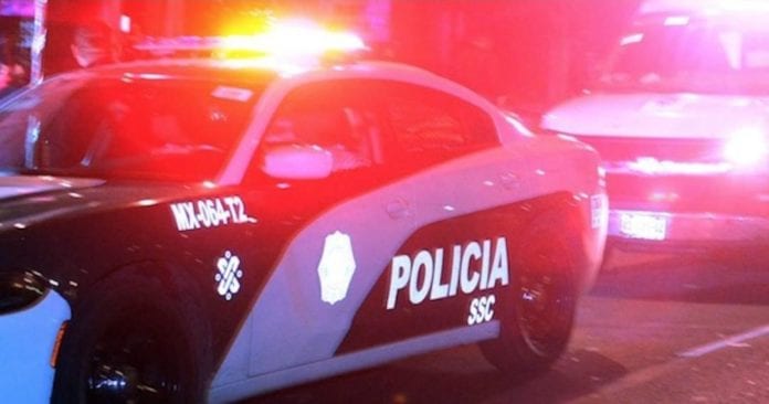 Sujeto armado es detenido al ser hallado junto a un cadáver en un elevador