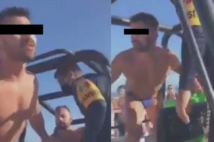 DETIENEN A PAREJA GAY POR BESARSE