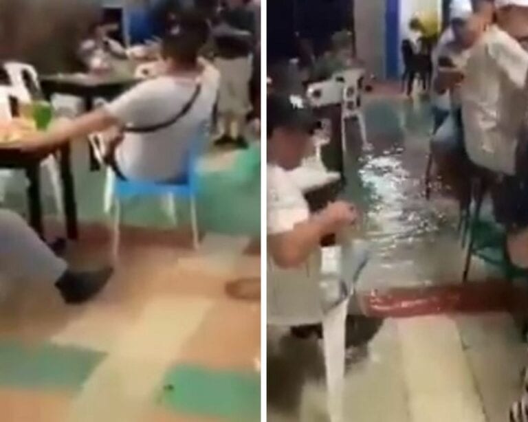 Captan a personas tomando en un bar inundado en Tabasco como si nada
