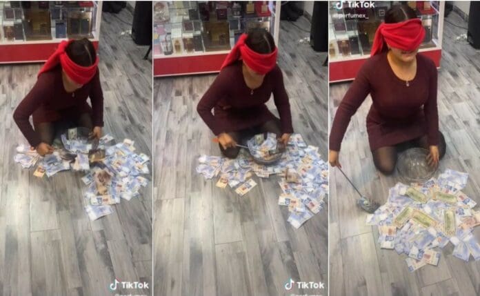 VIDEO empleados recogen dinero del suelo con ojos vendados, lo que agarren es 'su aguinaldo'