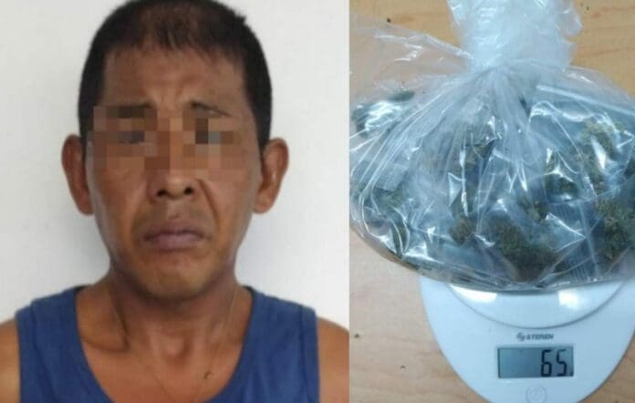 Cerca de 50 bolsas con hierbe verde y una báscula le fueron halladas a esta persona en la Colosio de Playa del Carmen. Foto: SP de Solidaridad