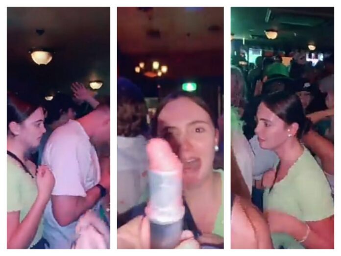 Chica disfruta pintar con labial camisa de hombres en un bar y hace viral