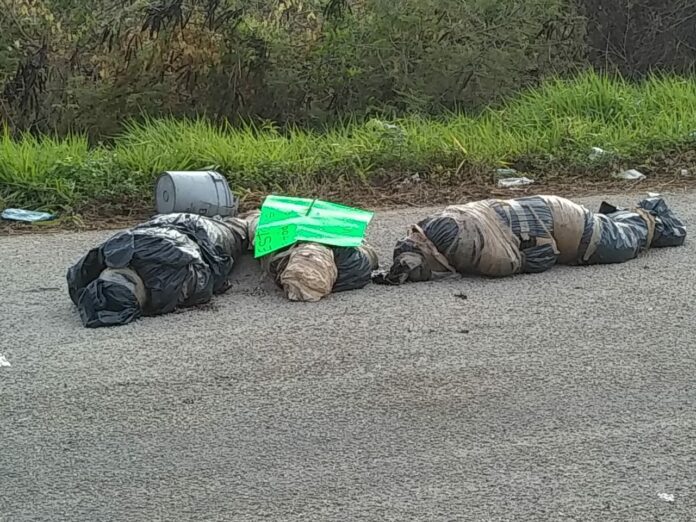 Hallan tres cuerpos embolsados en la vía corta de Chetumal a Mérida 