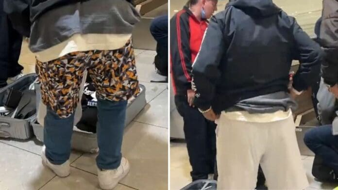 Sujeto no quiso pagar exceso de equipaje, abrió la maleta y se puso varias piezas encima