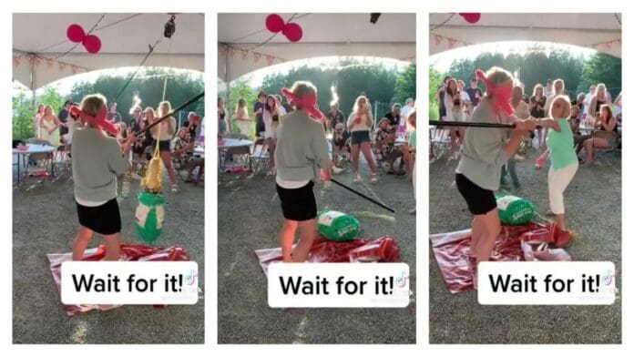 En una piñata, mujer golpea 