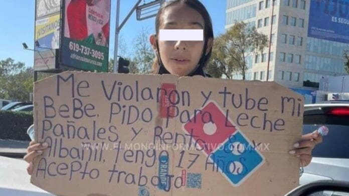 Menor pide apoyo en semáforo, “Me violaron y tuve a mi bebé”, afirma su cartel