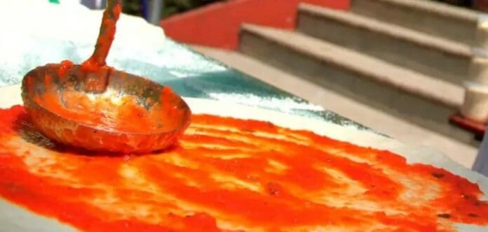 Descubren 12 kilos de droga ocultos en latas de salsa para pizza en Querétaro