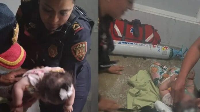 Mujer policía rescata a bebé de morir por asfixia