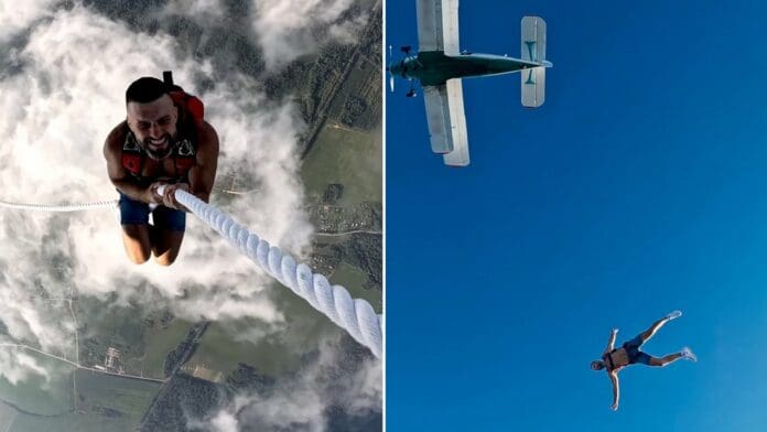 Ruso realiza acrobacia aérea sin protección y regresa al avión por una cuerda