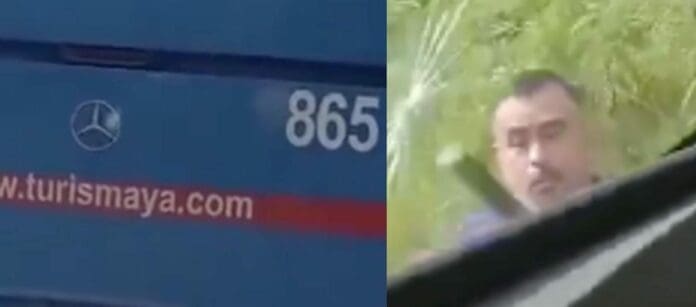 Un conductor de la empresa Turismaya cierra el paso a un ADO en Cancún; quiso agredir con un palo al otro chofer.