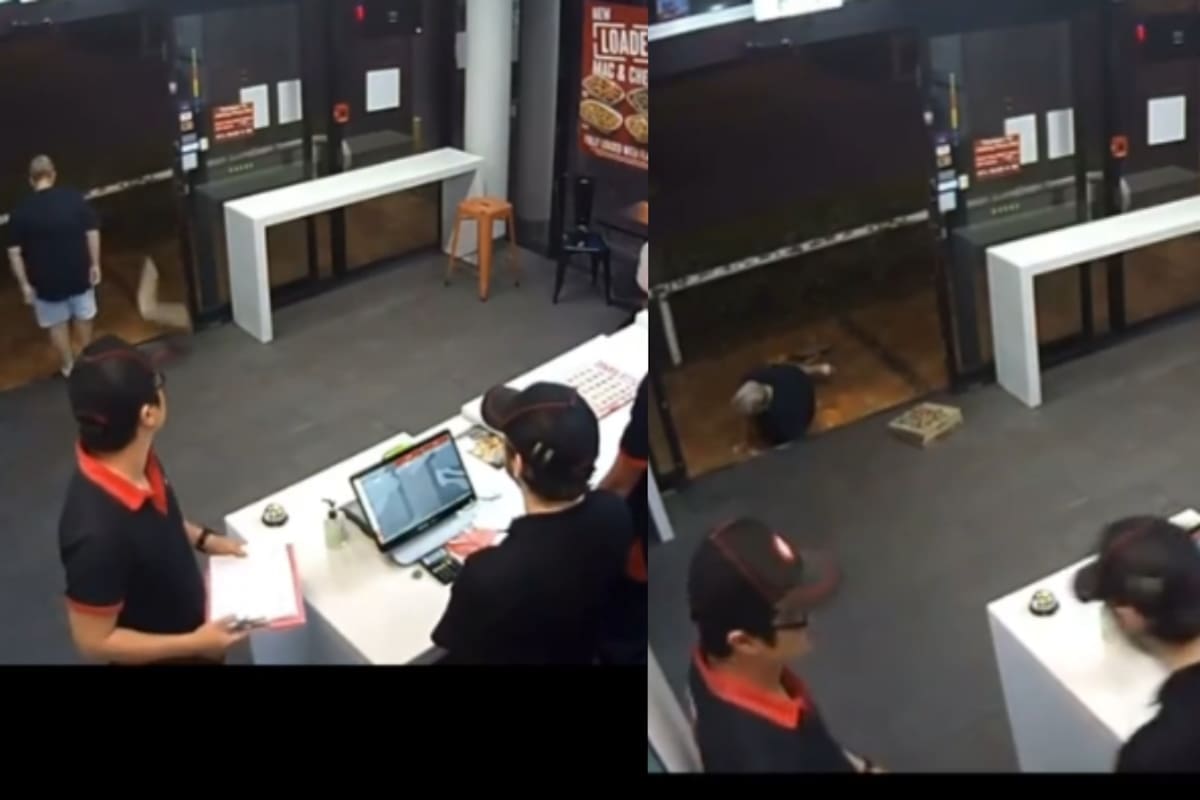 VIDEO: Mujer molesta tira su pizza al salir de un restaurante, se resbala sobre ella y termina golpeándose
