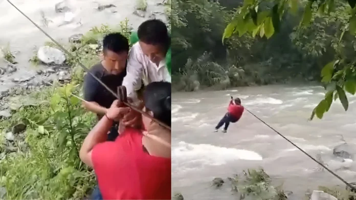 Improvisan tirolesa para cruzar río desbordado en Hidalgo