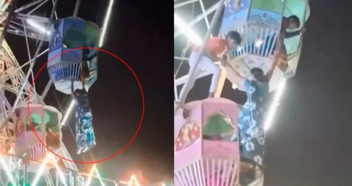 Mujer queda colgada de una rueda de la fortuna en India