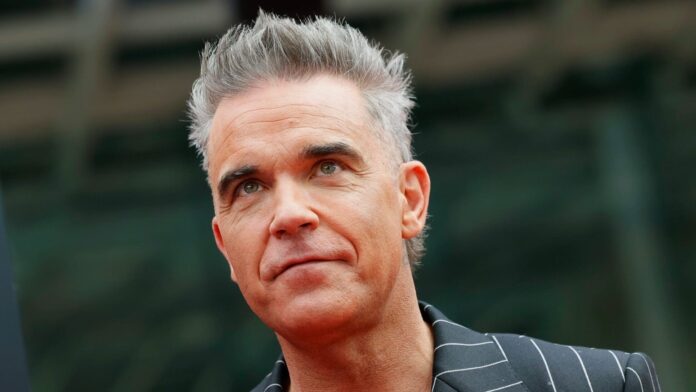Revela Robbie Williams que sufre de trastornos neurológicos y problemas de salud mental