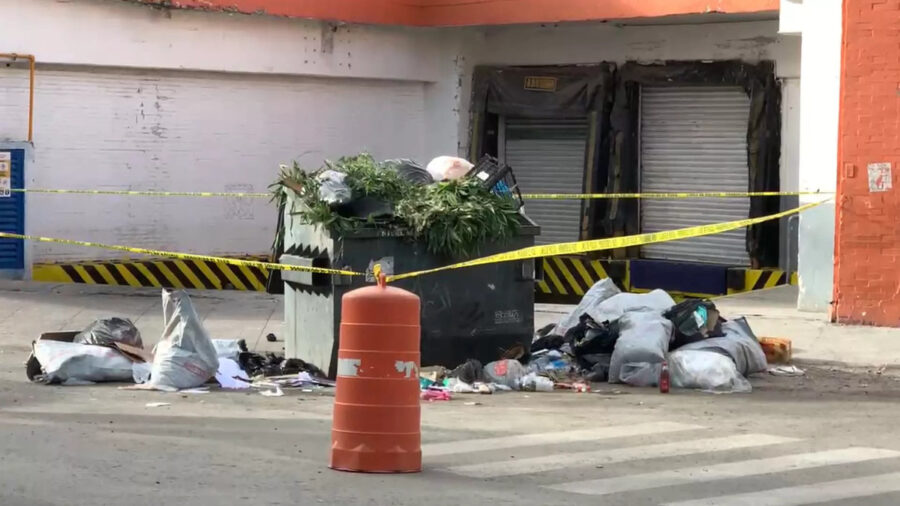 Abandonan restos humanos en un contenedor de basura en Puebla